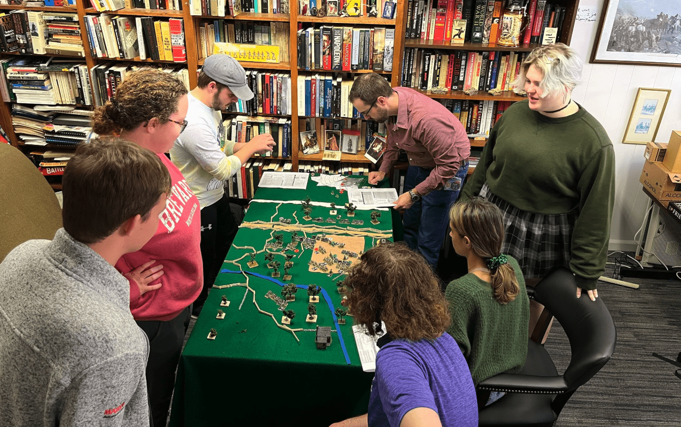 Group gathered around a game